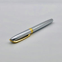 Laden Sie das Bild in den Galerie-Viewer, Legend chrom/gold X-Pen Tintenroller geschl schräg